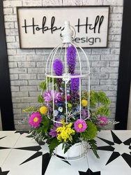 Caged in Blooms from your Sebring, Florida florist