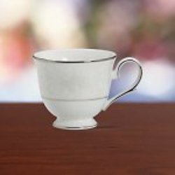 Opal Innocence Cup & Saucer from your Sebring, Florida florist