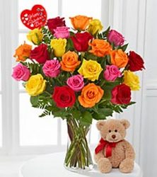 Two dozen mixed roses in a vase from your Sebring, Florida florist