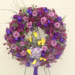 Sympathy Wreath in Purple and Yellow from your Sebring, Florida florist