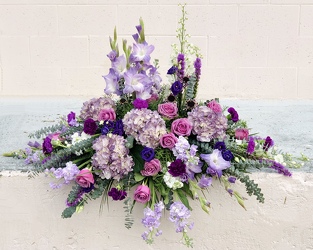 Purple Casket Spray from your Sebring, Florida florist