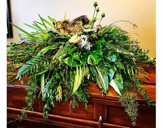 Serene Casket Spray of Foliage from your Sebring, Florida florist